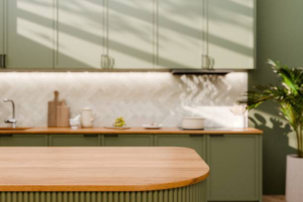 istock Modern Kitchen with Green Cabinets and Wood Finish. 3d render. 2192608712