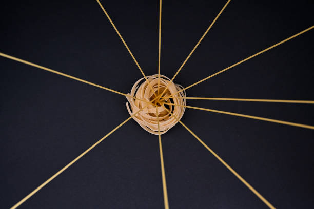 raw spaghetti on the dark background