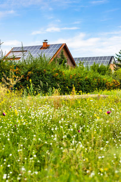 istock House with solar panels on a summer day 2192609841