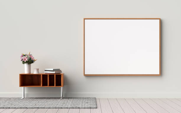 istock Modern interior design with blank canvas, flowers, and books 2192611308