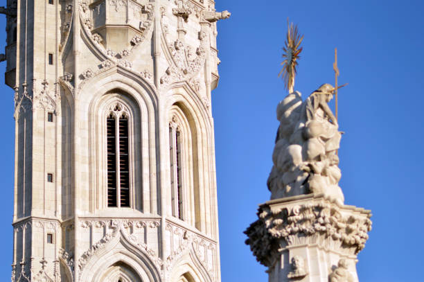 clock tower of the Belfry in Ghent, a UNESCO World Heritage Site. The dragon, since 1377 on the tower, not only keeps an eye on the city, but is also the symbolic treasurer of the Belfry; Ghent, Belgium