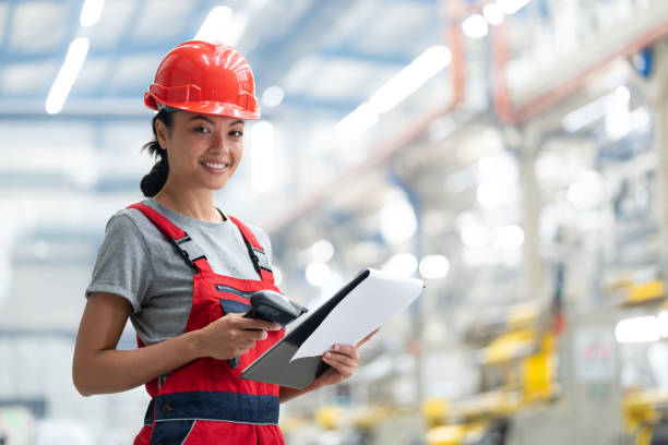 istock Asian woman worker scanning with bar code scannerin in factory. 2192613363