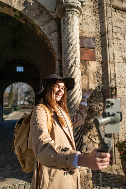 istock Travel Blogger's Life around the World in a Hat with Monopod 2192617543