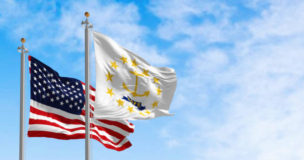 Rhode Island state flag waving with the american flag. Gold anchor in the center surrounded by thirteen gold stars. 3d illustration render. Rippling fabric.