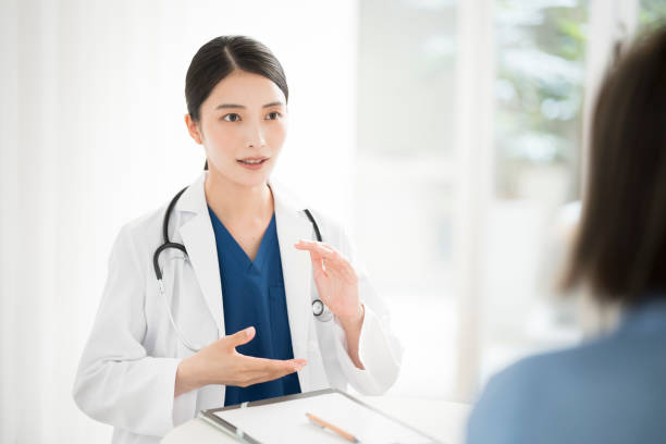young japanese female medical worker - 診断書 日本 ストックフォトと画像