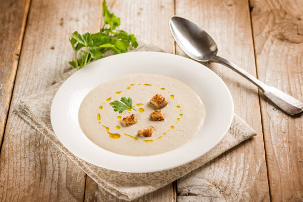 istock artichoke cream soup with sliced bread 2192631649