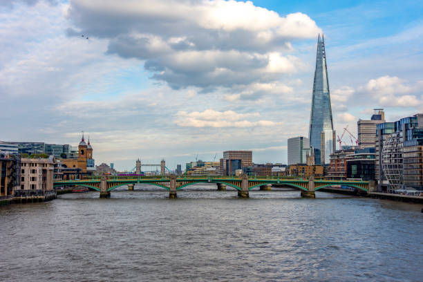Shard skyscraper and bridges over Thames river, London, UK