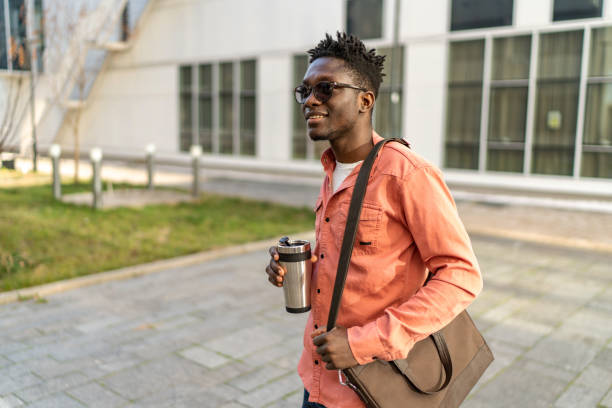 istock Handsome young man is having his coffee to go 2192633503