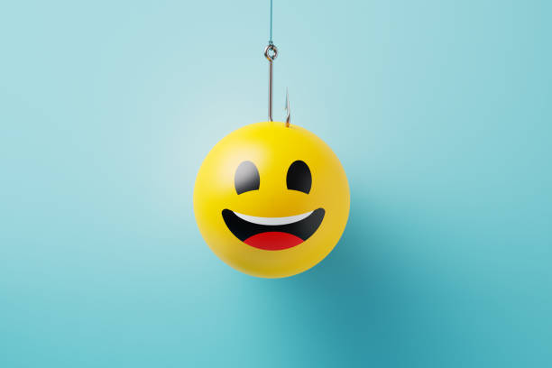 istock Smiley Face Hooked By A Fishing Hook On Blue Background 2192633758