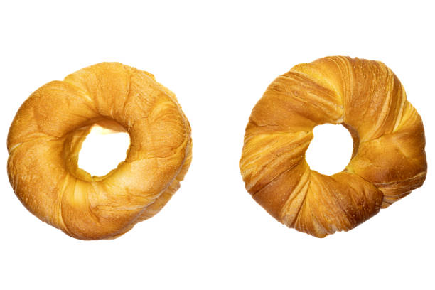 Brown round cheese bread on isolated white background.
