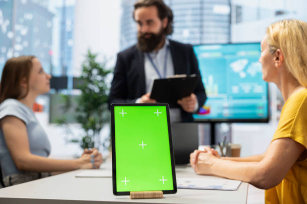 istock Agent in office using chroma key notebook to provide financial advice 2192638360