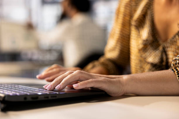 istock Confident skilled entrepreneur seated at her corporate office desk 2192640299