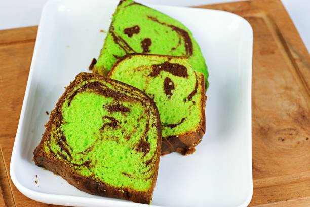 istock Delicious pandan marble cake slices served on a white plate. T 2192643199