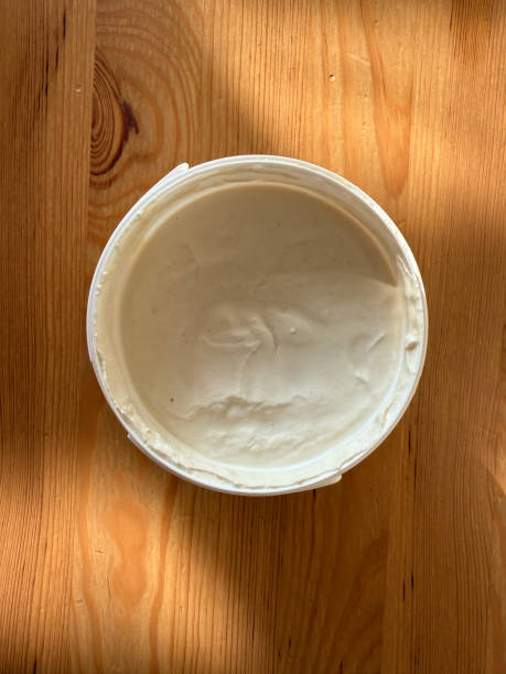 istock Cashew cream cheese with nuts and crackers, vegan dairy alternative close-up 2192643364