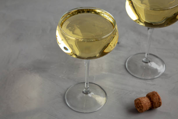 istock Sparkling Champagne in a Coupe Glass on a gray background, side view. Copy space. 2192643574