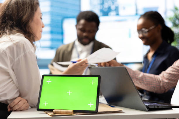 istock Employees and shareholders using chroma key screen in a corporate briefing 2192645662