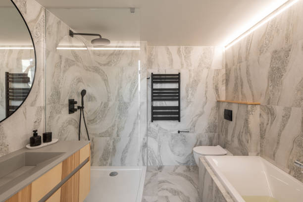 istock An Elegant, Modern Bathroom featuring Stunning Marble Design and Abundant Natural Light 2192649245
