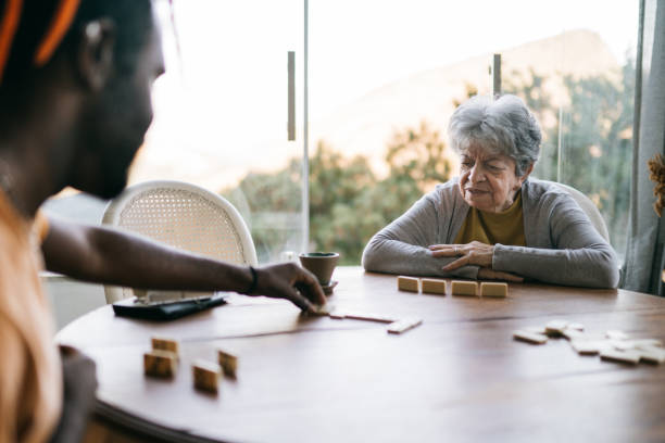 istock Friends playing domino together 2192649557