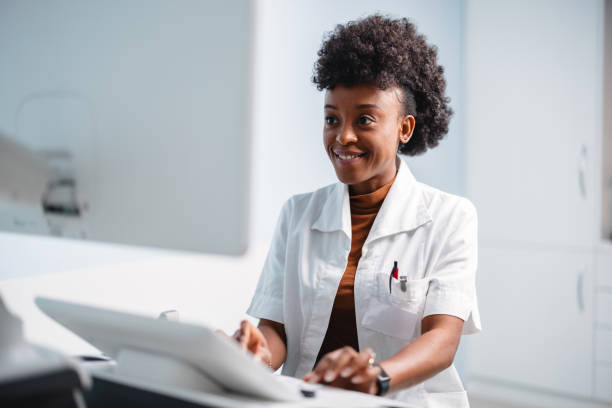 istock Smiling Ultrasound Technician in Medical Clinic 2192649615
