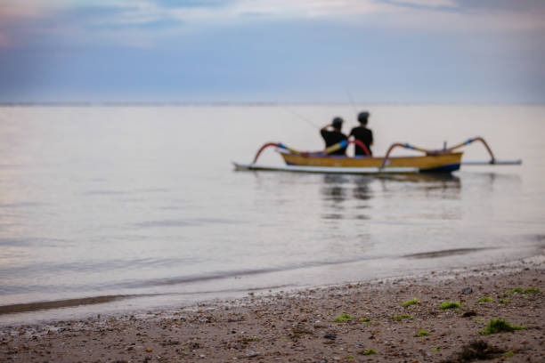 Fishing boat on Sanur beach, Bali Island - Indonesia.