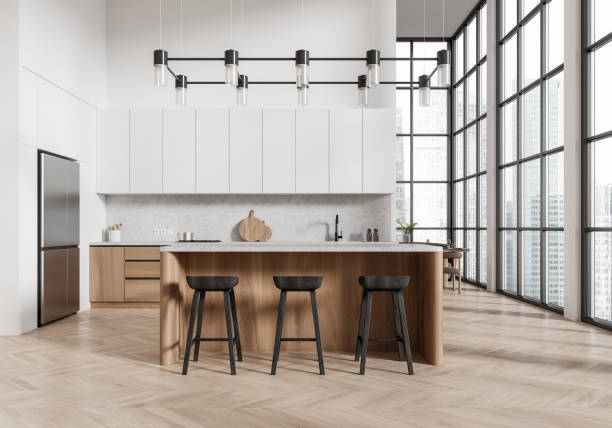 istock Home kitchen interior with bar counter and cabinet, table near panoramic window 2192651826