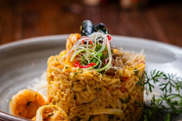istock Gourmet seafood risotto with herbs and vegetables. 2192652224