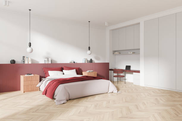 istock Modern bedroom with minimalist design, red accents, and built-in workspace. 3D Rendering 2192653008