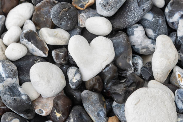 A stack of pebbles arranged in the shape of a heart