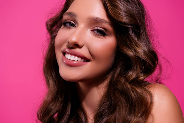 istock Glamorous brunette beauty radiating charm and confidence against pink background 2192654797