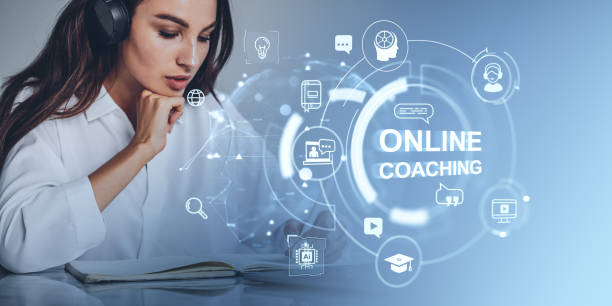 istock Woman using headphones engaged in online coaching on digital int 2192655599