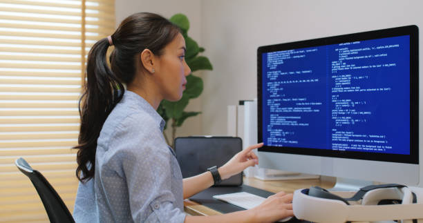 istock Metaverse app STEM platform developer future skill job workforce for asia people young woman work at home office wear VR headset typing test game on AI IT cyber security cloud computing web solution. 2192656252