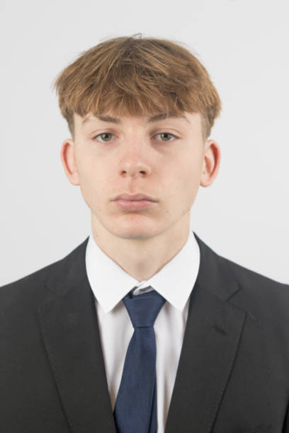 istock Teenage boy wearing a suit 2192659530