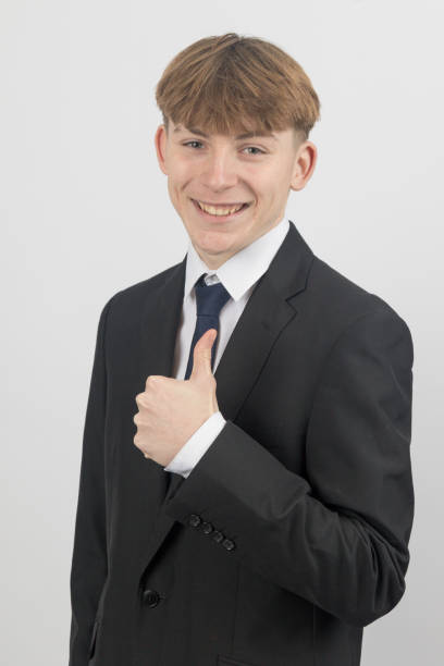 istock Teenage boy wearing a suit 2192659587