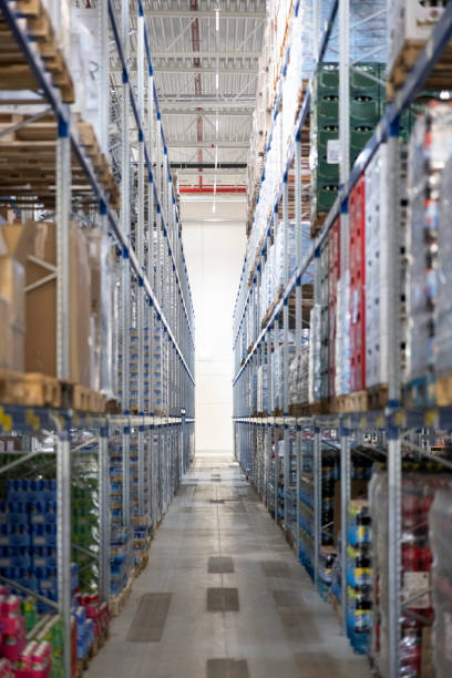 istock Interior of warehouse with stacked boxes and soft drinks 2192659634