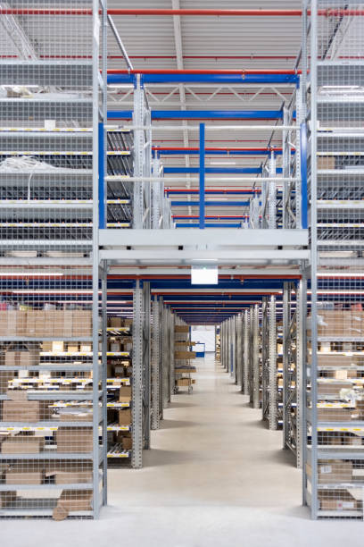 istock Organized aisle in industrial warehouse with storage racks 2192660383