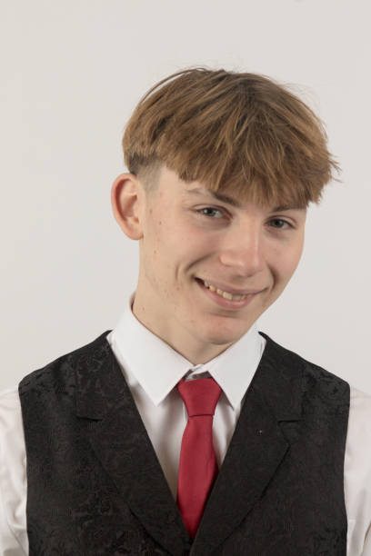 istock Teenage boy wearing a suit 2192661116
