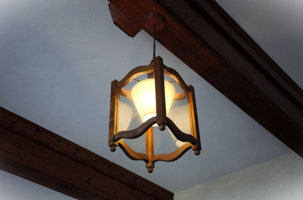 istock Beautiful wooden chandelier decorating the ceiling 2192662248
