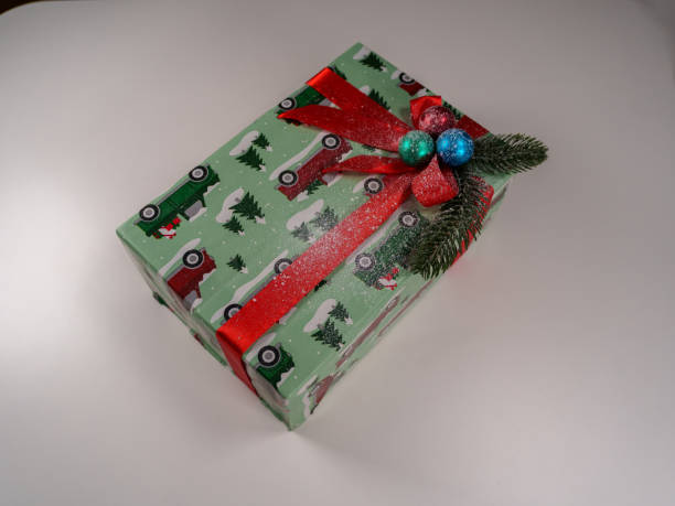 istock Colorful Christmas gift box decorated with festive elements and ribbons 2192671122