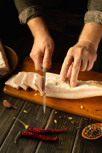 istock Mastering the art of culinary preparation with fresh fish and spices in a rustic kitchen. Ukrainian national food 2192673308