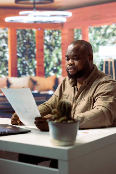 istock Successful entrepreneur using his laptop for remote business operations 2192676042