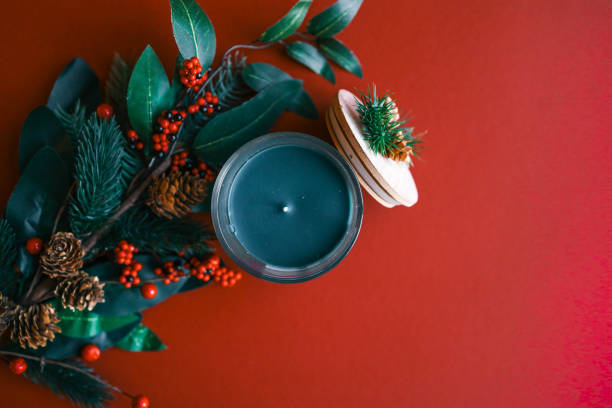 istock A festive glass candle labeled 