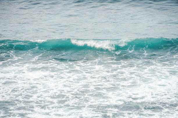 istock Dangerous high tide wave on the beach. Watu Karung beach, Pacitan, East Java, Indonesia. 2192677623