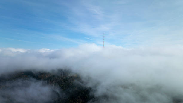 Fog and clouds over mountains and woodlands
