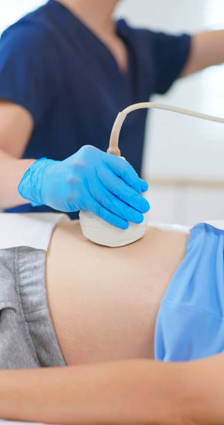 istock elder receive abdominal ultrasound 2192678467