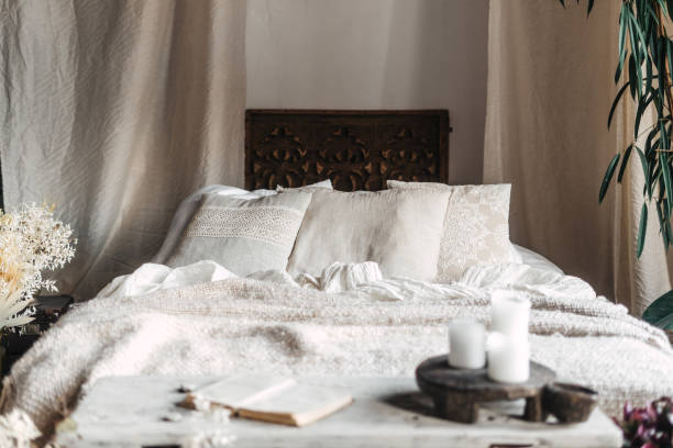 istock Cozy modern bedroom with bohemian decor and soft bedding accents 2192680066