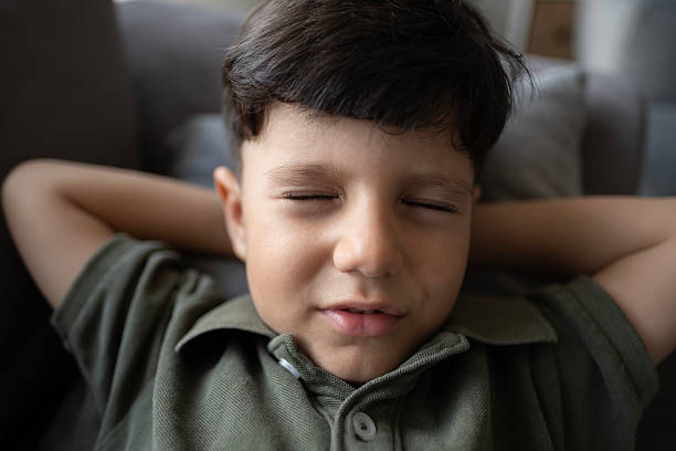 Portrait of little boy looking at camera