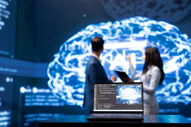 istock Close up of laptop used by employees developing AI systems in tech startup 2192683635