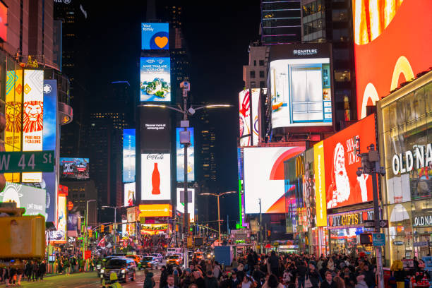 istock Vibrant Times Square Night View with Busy Crowd and Neon Advertising 2192683725