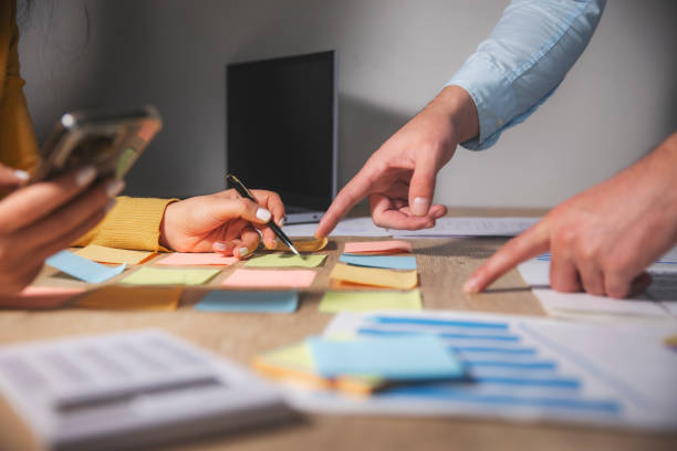 istock business team discussing charts with graphs and charts 2192683796