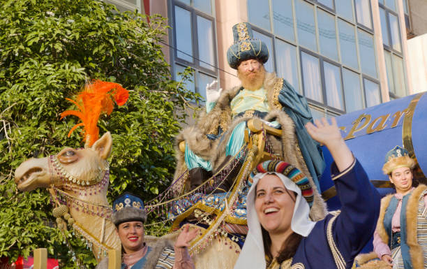 Las Palmas de Gran Canaria, Spain - January 5 2025: Tourists and locals enjoy Cavalcade of Magi, a traditional parade with Three Magi on Epiphany's eve